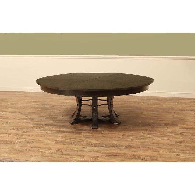 Extra-large expandable round dining table with self-storing leaves. This super-sized Jupe table measures 82 inches round...