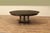 Extra-large expandable round dining table with self-storing leaves. This super-sized Jupe table measures 82 inches round...