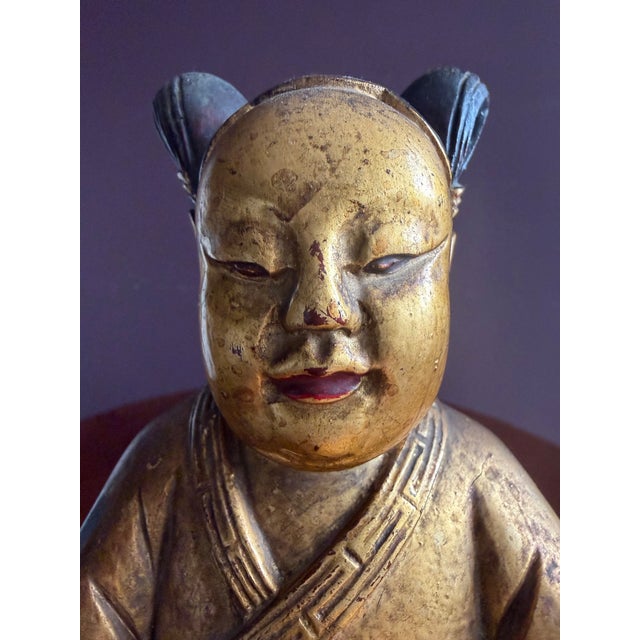 Gold Chinese Carved Wooden Quan Yin or Ancestor Figure on Foo Dog Incense Holder. Beautiful Carving Sang De Bouef Undertones With Gold Overlay. For Sale - Image 8 of 10