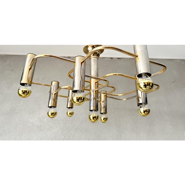 Mid-century modern lamp from the 1970s. Designed by Italian designer Sciolari but made by the Belgian company Boulanger....