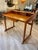 A desk made of teak wood with a Swedish-style design. The desk was made in the 1950s and displays characteristics typical...