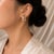 Traditional Late 20th Century Pair of 14K Yellow Gold Diamond Ruby Huggie Half Hoop Earrings For Sale - Image 3 of 3