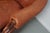 This pair of cognac-colored leather club chairs come from the Netherlands. They are upholstered with patinated cognac-...