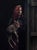 Baby by Mary Carroll | Acrylic Painting of a woman holding a fawn at a doorway. For Sale - Image 4 of 5