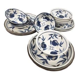 Set of 16-Piece Japanese Blue & White Ceramic Dinnerware for 4 With Pomegranate Motifs For Sale