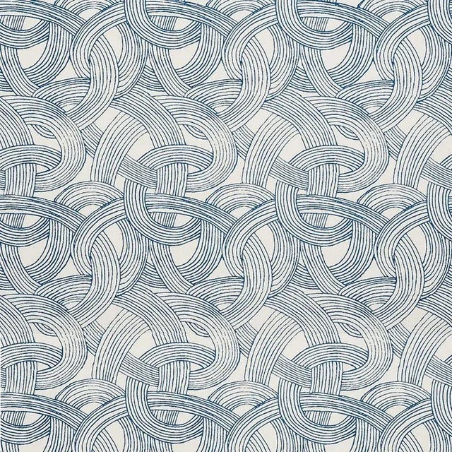 Freeform features a dynamic scrolling, curvilinear pattern printed on a Linen ground. Its large, intertwining repeat makes...