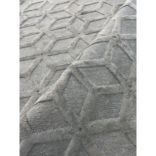 Beautiful hand knotted modern rug. Made of wool with very modern design and colors, this extremely gorgeous rug is an eye-...