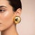 This exquisite pair of 1970s Italian clip-on earrings perfectly captures the bold, sculptural elegance of vintage European...