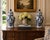 A classic pair of blue and white ginger jars, decorated throughout with delicate Chinese floral motifs. The pattern is...