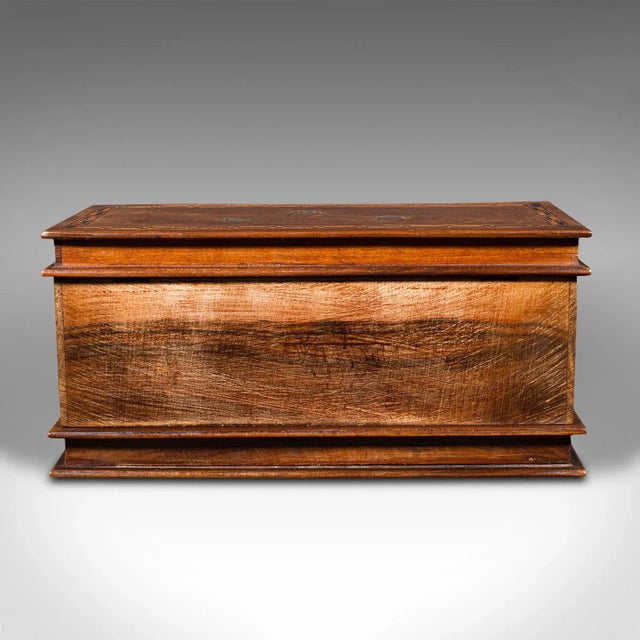 This is an antique ladies vanity box. An Italian, olive wood keepsake or jewellery box, dating to the early 20th century,...