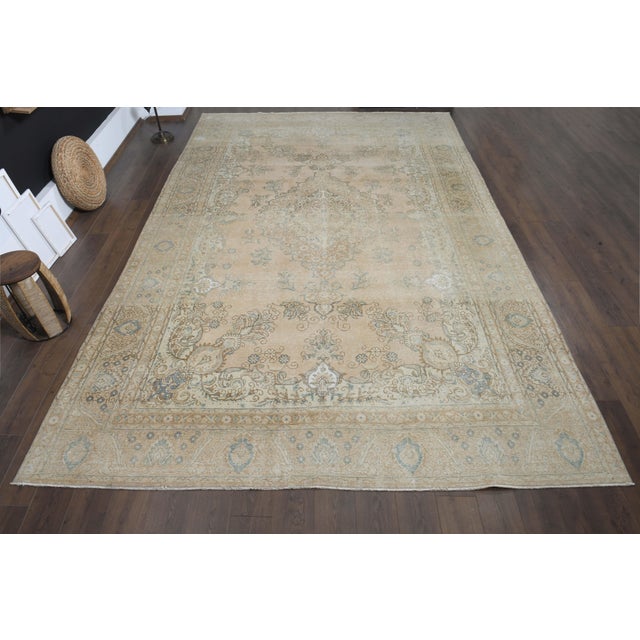 Vintage Persian Hand-Knotted area rug is a semi-antique vintage area rug. The '70s Eastern region of Anatolian's unique...