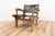 Lounge chair by Angel Pazmino for Muebles de Estilo. The chair is made out of wood and features interlocking joints, held...