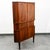 Outstanding Danish rosewood corner cabinet on tapered legs designed in Denmark, circa 1960s. Features four central...
