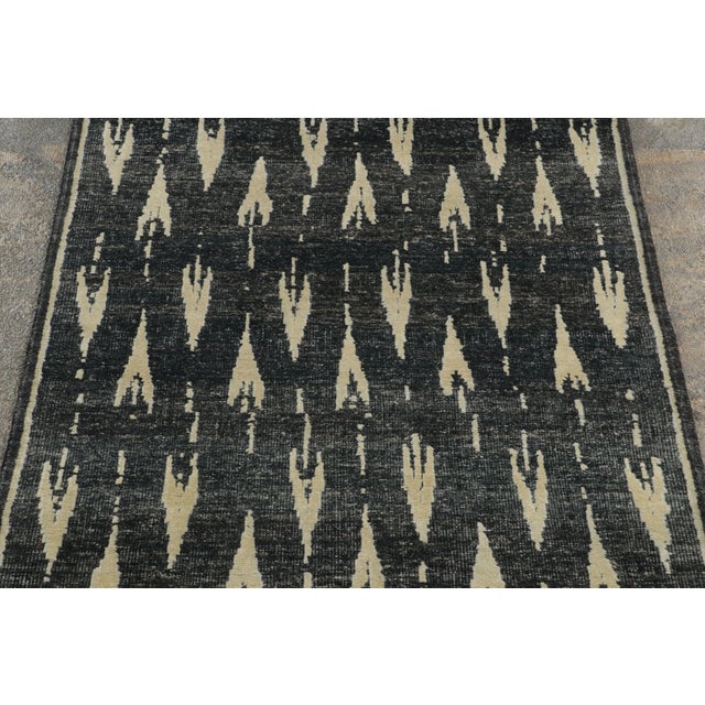 Hand-knotted in natural silk, this contemporary 2x10 runner joins Rug & Kilim’s Block Print collection, translating the...