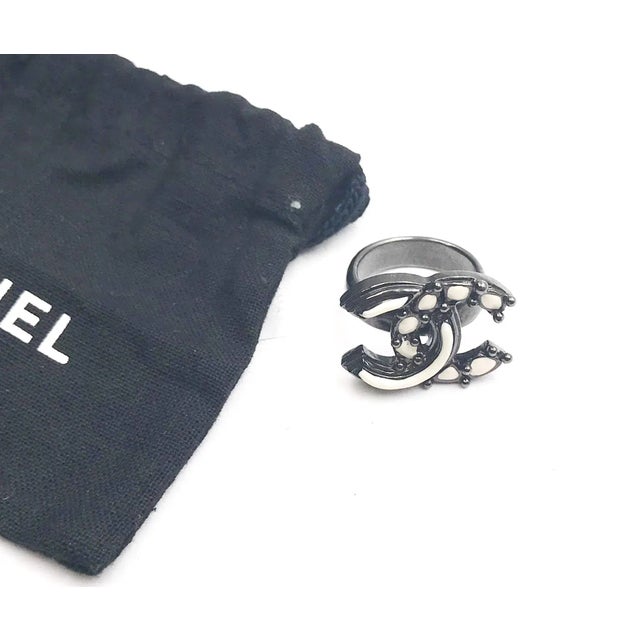 Chanel Off White Pop up Enamel Gunmetal CC Ring *Marked 12 *Made in Italy *Comes with original dustbag -Approximately size...