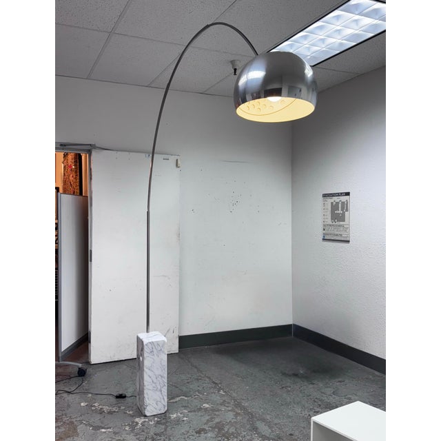 Design Plus Gallery presents the Arco Floor Lamp by Achille + Pier Giacomo Castiglioni for Flos. An icon of Italian...