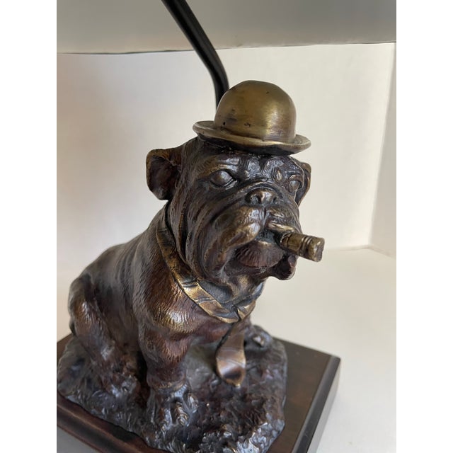 Here is a fantastic, table lamp designed by Frederick Cooper in the later 20th c. The lamp features a bronze bulldog with...