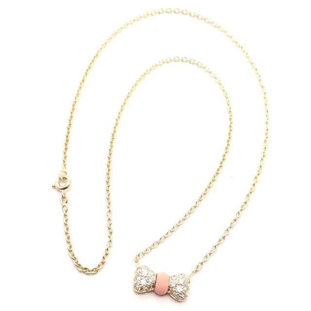 Metal: 18k yellow gold Length: 15.5" Pendant: 15mm x 8mm Weight: 5.3 grams Stones: 20 diamond VVS1 clarity, G color total...