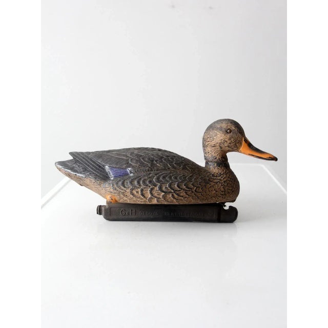 This is a vintage G&H duck decoy. The American crafted mallard hen decoy is cast plastic with nice detailing and painted...