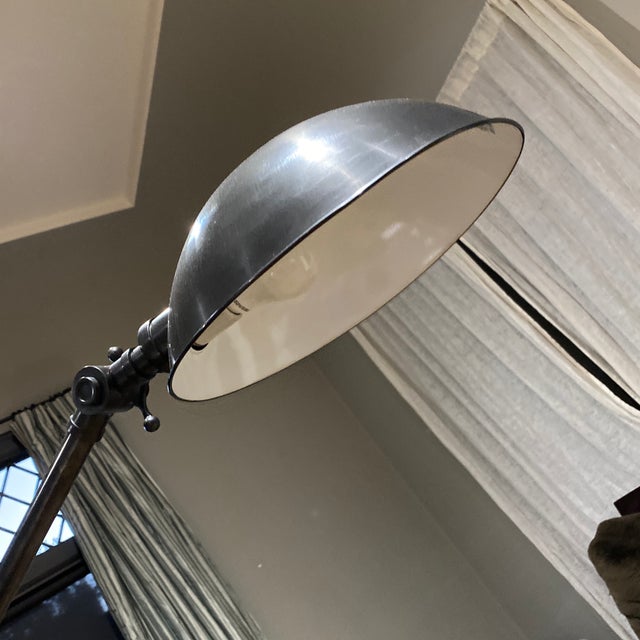 This supremely functional floor lamp showcases the beauty of the utilitarian design. A master at the art of stylish task...