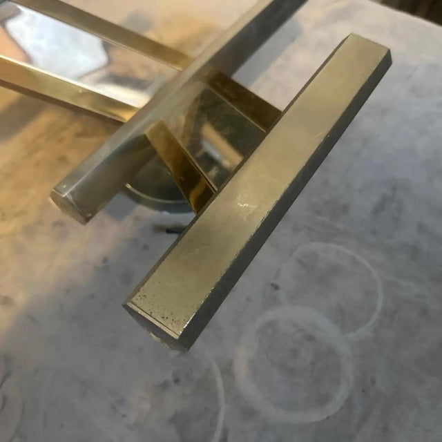 This sophisticated Italian Concorde wall sconce is an original 1960s creation by the celebrated designer Gaetano Sciolari,...