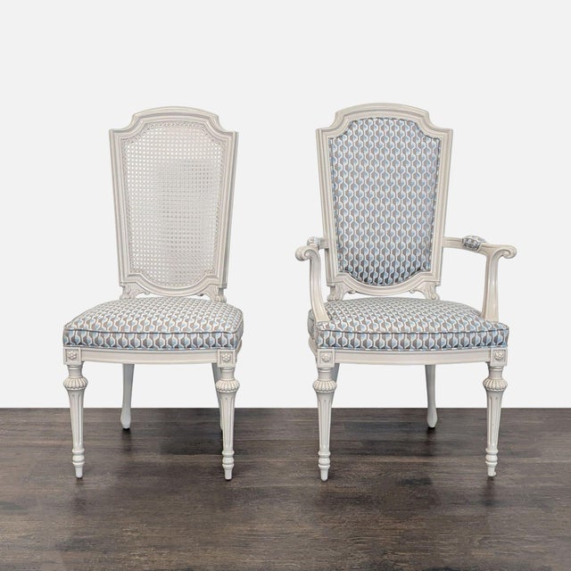 Carved set consists of 4 side chairs with cane backs and upholstered seats and 2 armchairs with upholstered backs and...