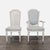 Carved set consists of 4 side chairs with cane backs and upholstered seats and 2 armchairs with upholstered backs and...