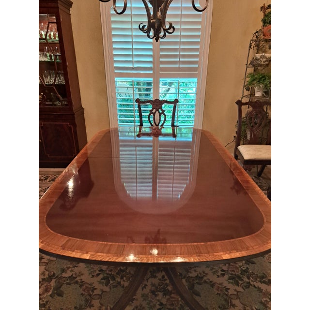 KINDEL FURNITURE PHYFE-STYLE DINING TABLE AND 8 CHIPPENDALE CHAIRS Want a $3,000 BUYERS INCENTIVE DISCOUNT? See qualifying...