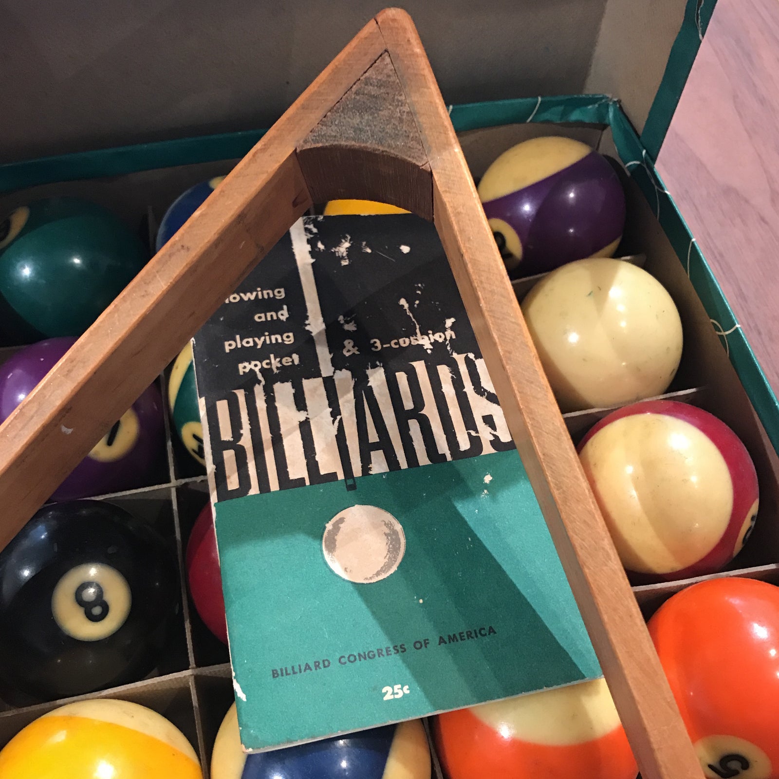1960s vintage complete billiard set of pool balls in original box. Belgium made and come with a wooden rack. Set has an...