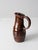Handmade studio pottery pitcher dated 1975 and signed E. Denu Cowen. Thrown in stoneware with a softly tapered form,...