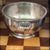A gorgeous piece of 1920s hospitality history, this heavy vintage silver plate serving bowl features the rare engraving of...
