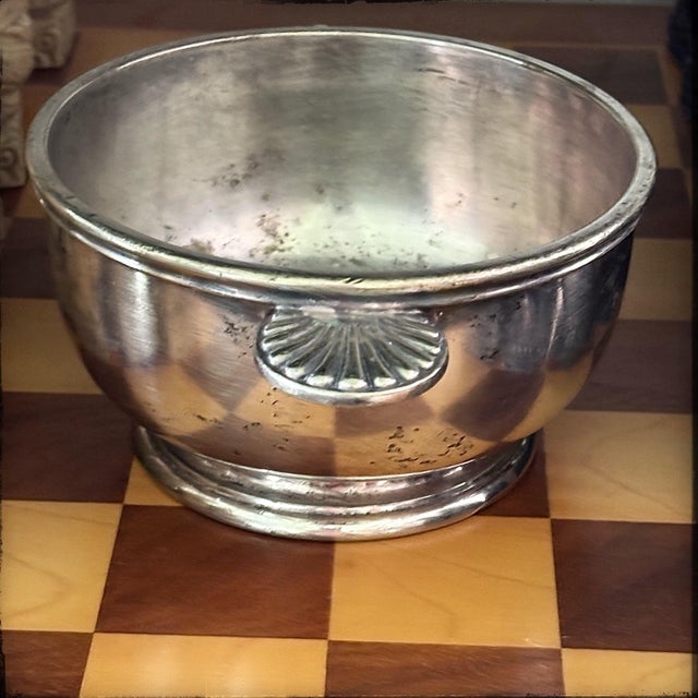 A gorgeous piece of 1920s hospitality history, this heavy vintage silver plate serving bowl features the rare engraving of...