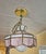 This is a vintage 1970s–1980s Tiffany-style slag glass pendant lamp featuring an 8-panel design composed of pearly, satin-...