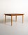 Scandinavian-made table from the 1960s, with an oak frame and a dark lacquered oak top. Two extension leaves. The top has...
