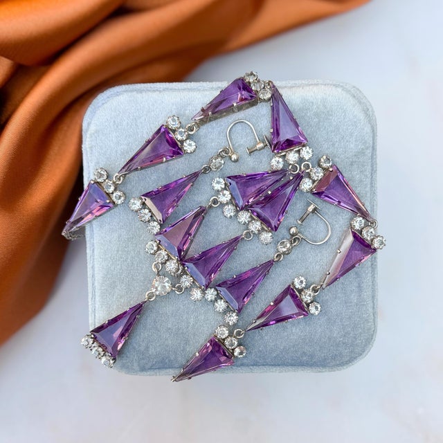 Made from silver, this elegant and rare jewellery set dates from the 1920s. Condition Report: Very Good - A tiny chip to...