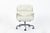 This white Model 3475 Eames Time Life Executive Lobby Chair designed by Charles & Ray Eames for Herman Miller was produced...