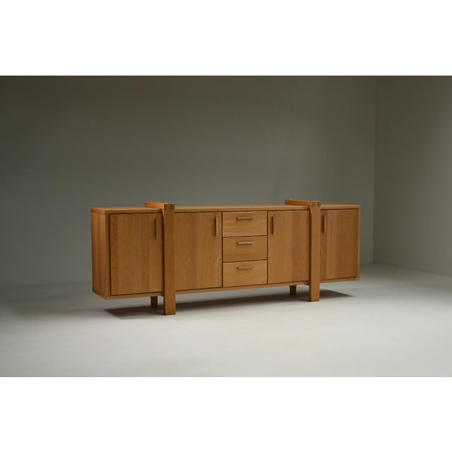 This Belgian sideboard is crafted mostly from solid oak and reflects the Brutalist style with its strong lines and...