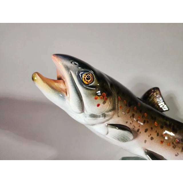 Decorative porcelain fish on glass 1950s decorative porcelain fish on base of a solid glass block. In excellent condition....