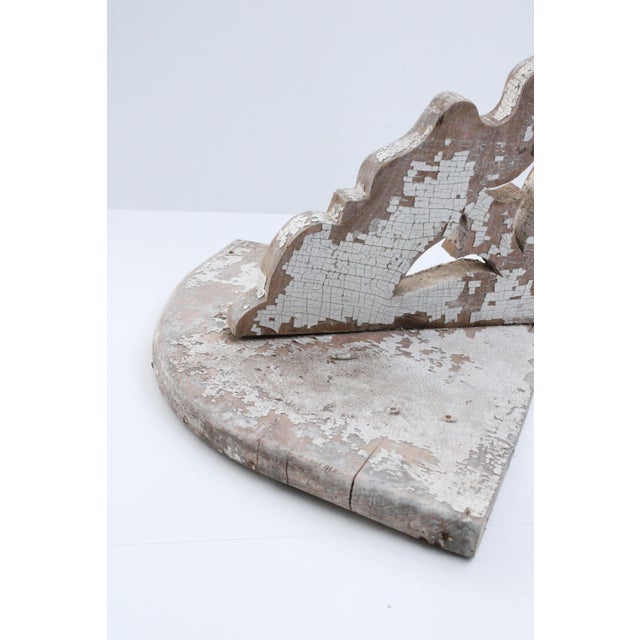 Carved antique French corner shelf with desirable crackle paint. This item is lead free and has been tested for lead.