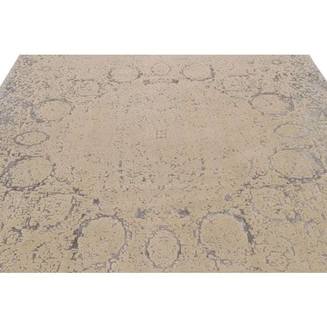 Hand-knotted in wool, this 8x11 modern rug by Rug & Kilim enjoys an abstract design with a subtle inspiration from antique...