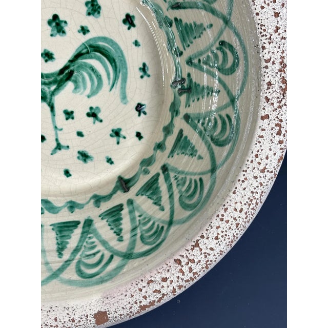 Large Spanish handmade and painted white and green glazed terracotta "Lebrillo" earthenware bowl in the style typical of...