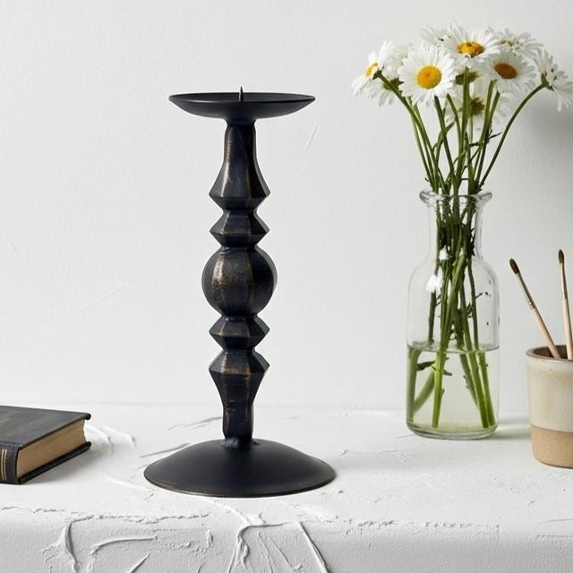 More Than Just a Light: Capture the Magic of the Night with the Nocturne Candlestick. If you are seeking not just an...
