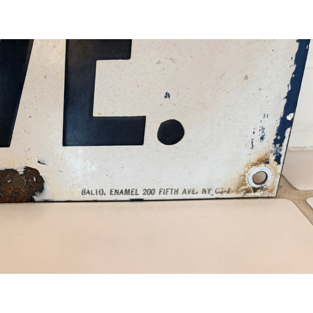 Historic vintage porcelain subway sign from the 1930s-1940s. This collectible showcases a piece of transportation history....