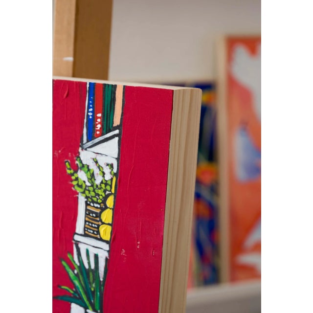 A ginger cat sprawls lavishly across the cushion-laden luxury of a window seat in this vibrant 16x20 painting loosely...