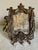 Antique Victorian bronze picture frame. Ornate decor, features Cupid and a harp. Comes with glass. Opening fits a 4 x 6”...