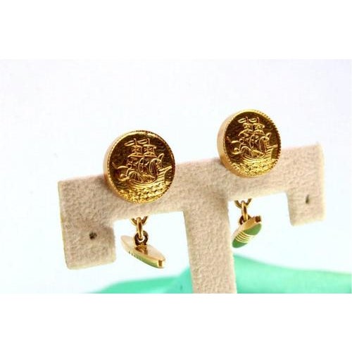 Yellow gold cufflinks with caravels in relief in perfect shape. Metal: Gold. Origin: Portuguese. Brand: Dragão. Weight:...