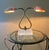 This vintage sculptural table lamp features two genuine natural seashells as shades with a two way switch for medium and...