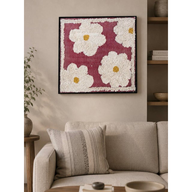 Bring a soft handcrafted charm to your space with this beautifully embroidered tufted wall frame featuring oversized...
