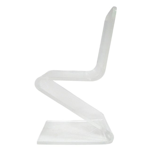 This classic lucite Z chair is a great occasional piece in very good original condition. The transparent quality and...
