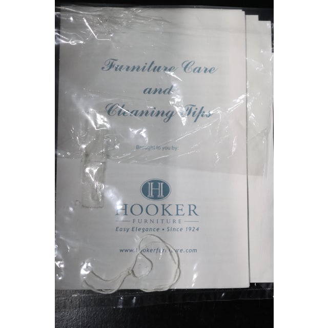 Country French–style nightstand from the Seven Seas collection by Hooker Furniture. This piece features a curved bombe...